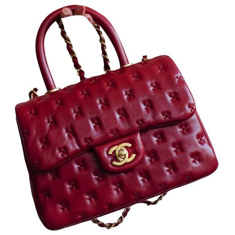 chanel bag with red handle